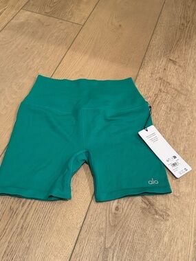 ALO Yoga Ribbed High-Rise Bike Shorts in Teal Green